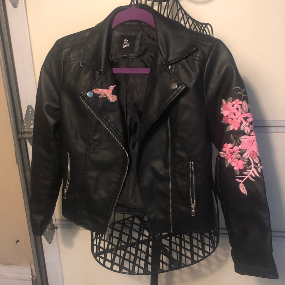 Leather jacket with embroidered patches